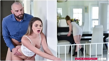 Athena Faris gives a blow fellatio to her step-father under the table